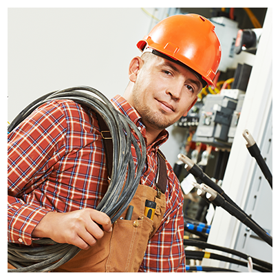 electrician engineer worker with cable in front of fuseboard equipment