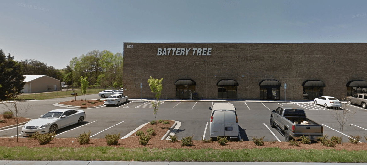 Parking Area on Front of Store ─ Kernersville, NC ─ Battery Tree