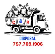 Trash truck filled with bags, "C & R" logo, "DISPOSAL" and phone number.