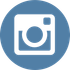 A white camera icon in a blue circle.