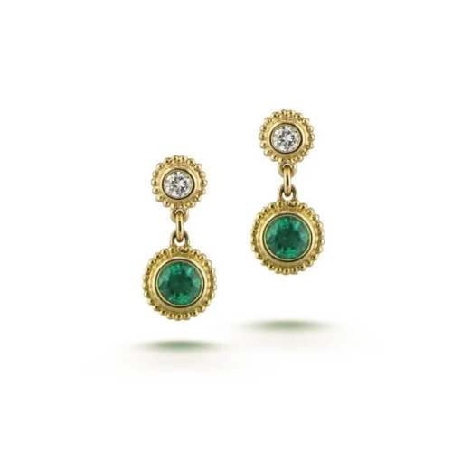 A pair of gold earrings with emeralds and diamonds