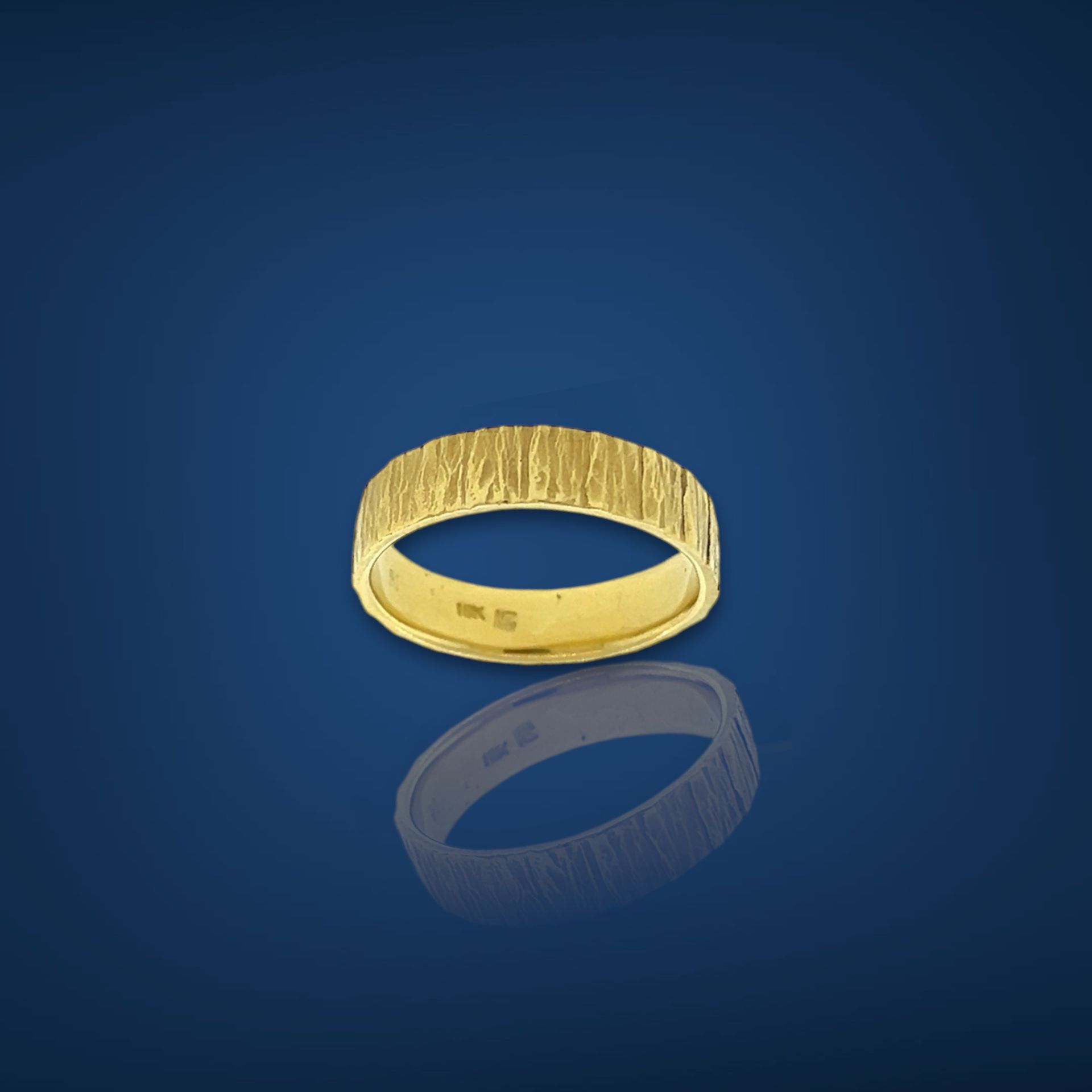 Bark texture wedding band 18k yellow gol