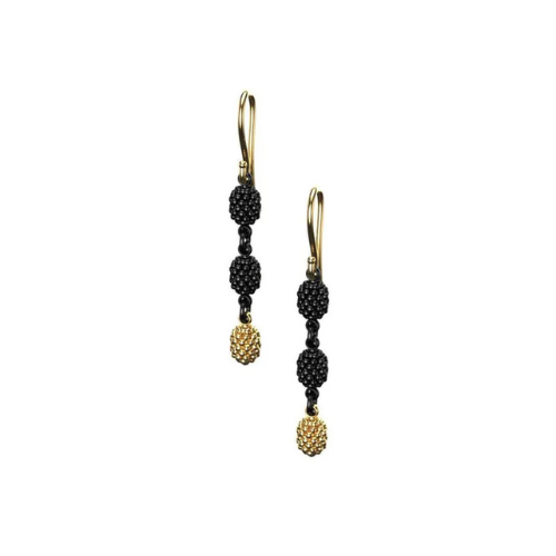 A pair of black and gold earrings on a white background