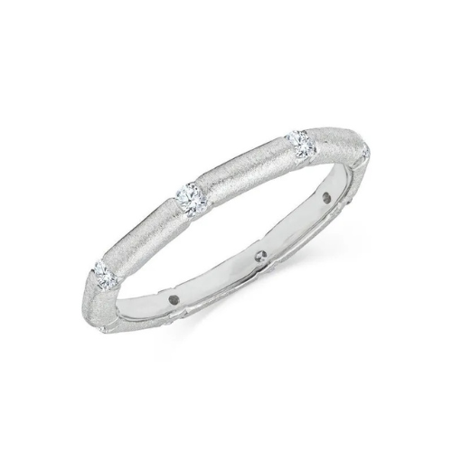 A white gold ring with three diamonds on it
