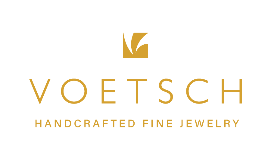 The logo for voetsch handcrafted fine jewelry is black and white.