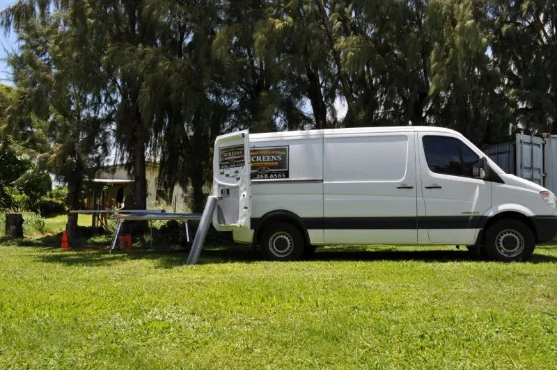 White car with open back door — Makawao, HI — Hawaiian Door & Window Screens