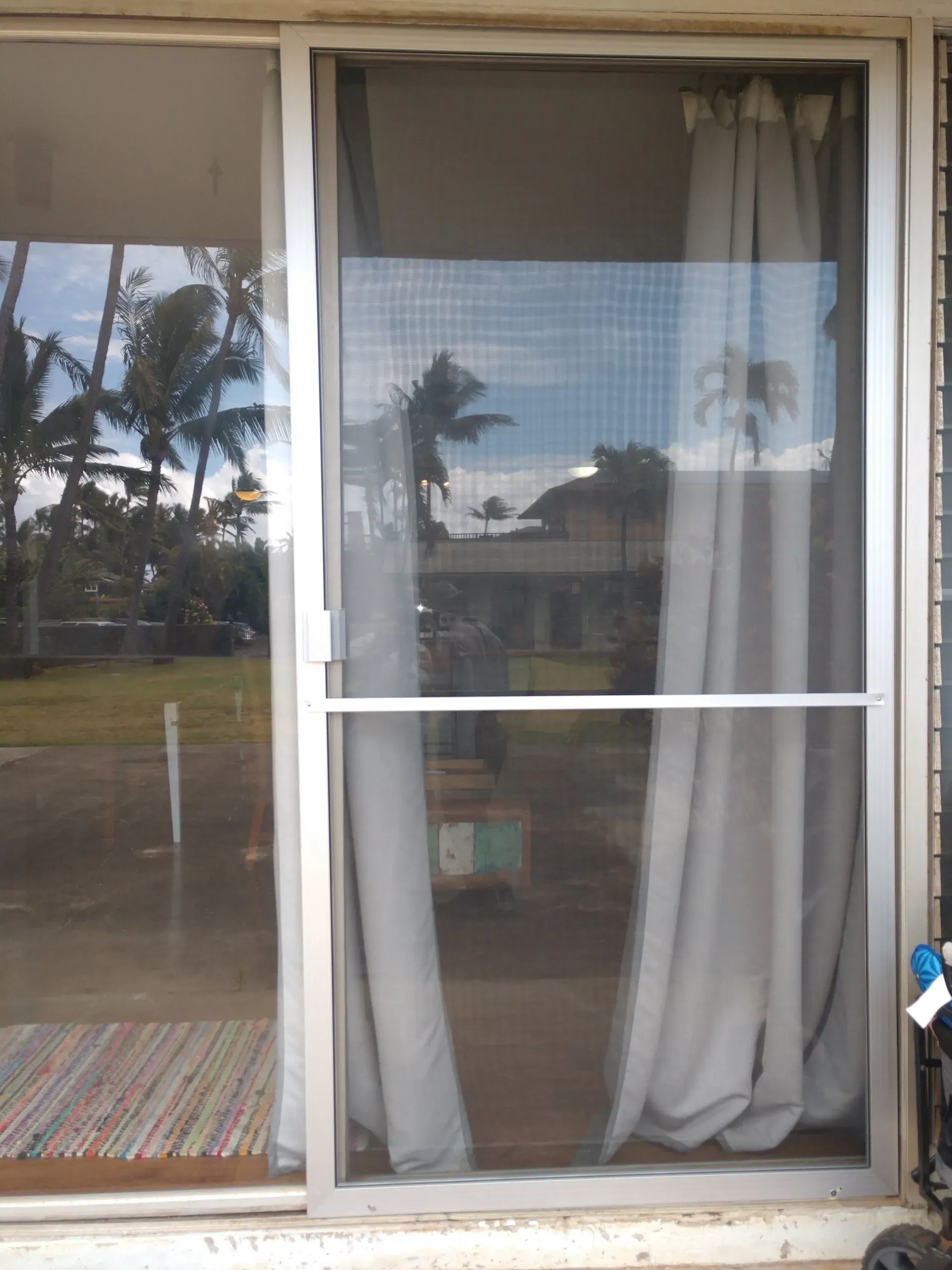 White sliding screen door for a vinyl glass fixture — Makawao, HI — Hawaiian Door & Window Screens