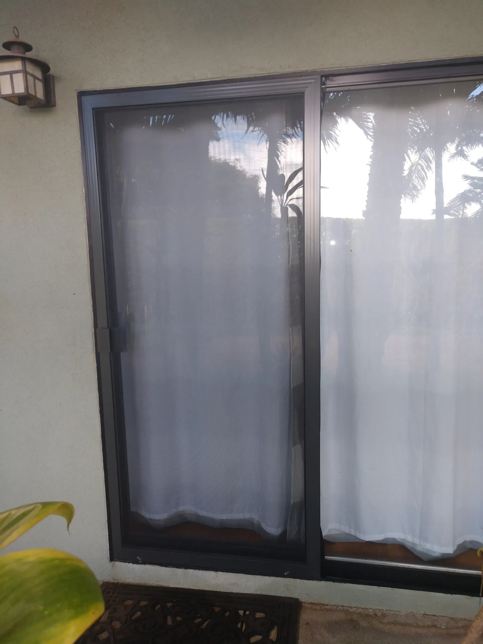 Window screen with white curtain — Makawao, HI — Hawaiian Door & Window Screens