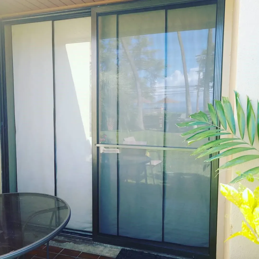 Screen door with black metal frame — Makawao, HI — Hawaiian Door & Window Screens