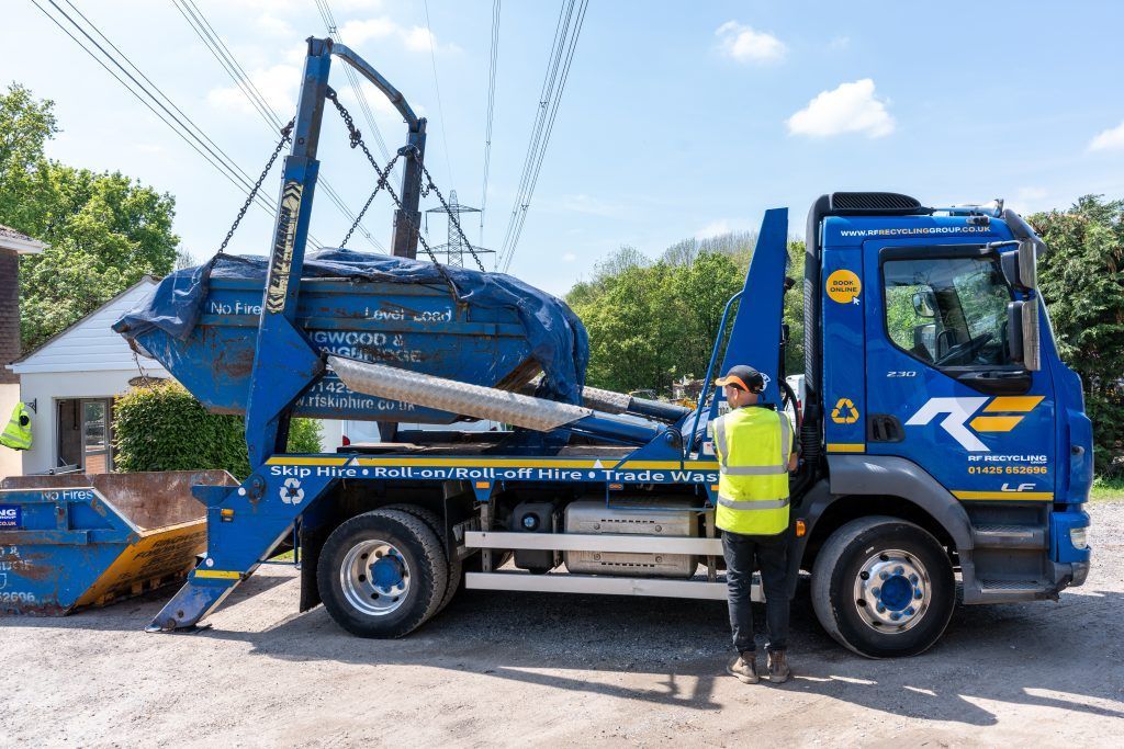 rf recycling collecting a skip from a domestic setting