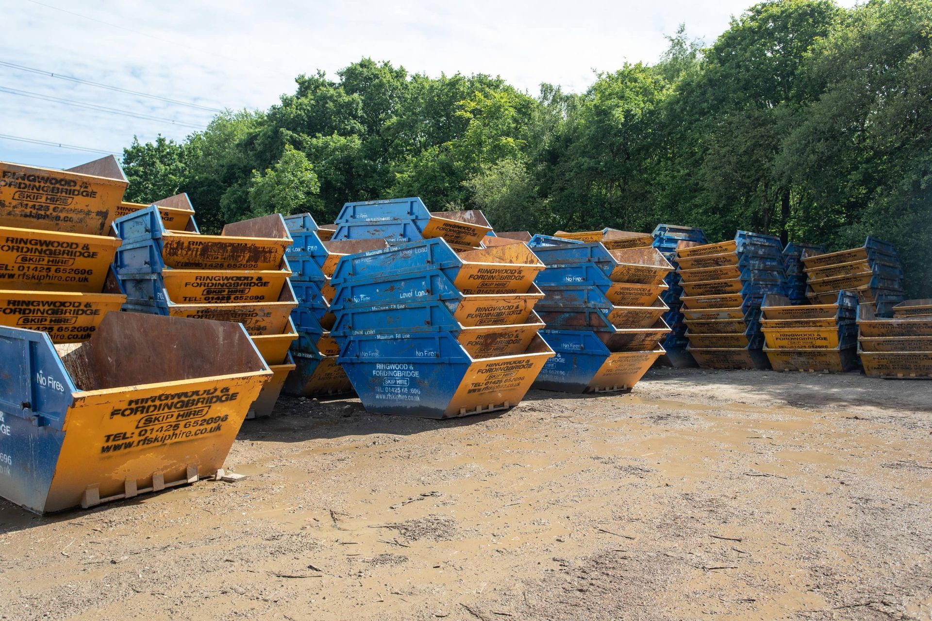 rf recycling empty skips stacked up 