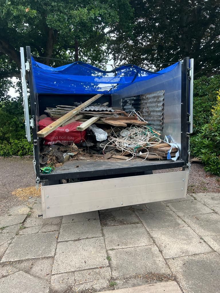 waste in the back of an rf recycling van 