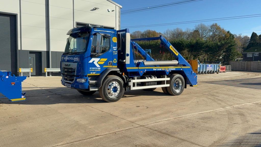 rf recycling lorry outside a warehouse