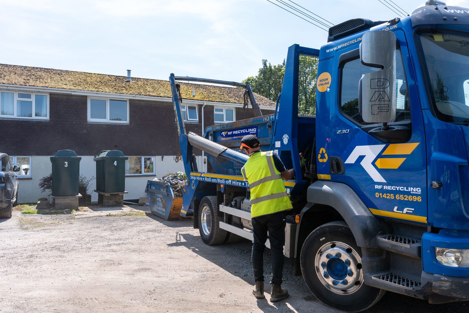 rf recycling dropping off a skip to domestic housing