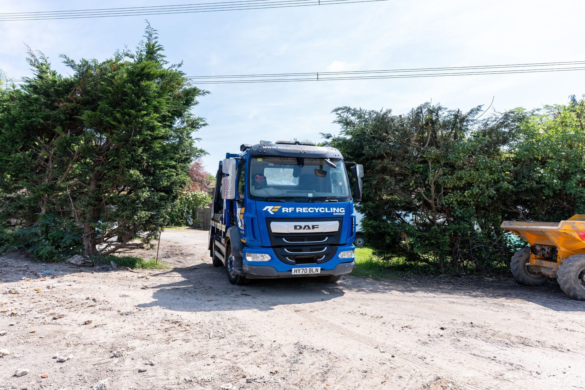 rf recycling lorry arriving on site 