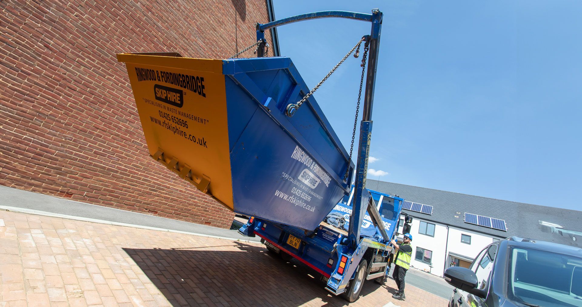 rf recycling lorry offloading a skip