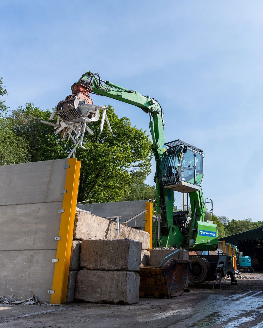 rf recycling digger at the recycling yard in fordingbridge