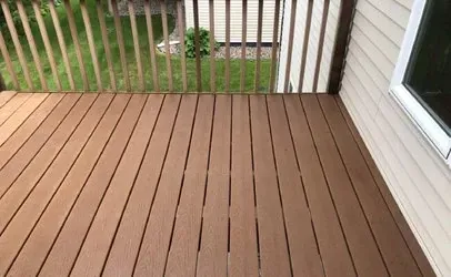 A Wooden Deck With A Railing And A Window Next To A House — Johns Island, SC — SoftWash Doctors