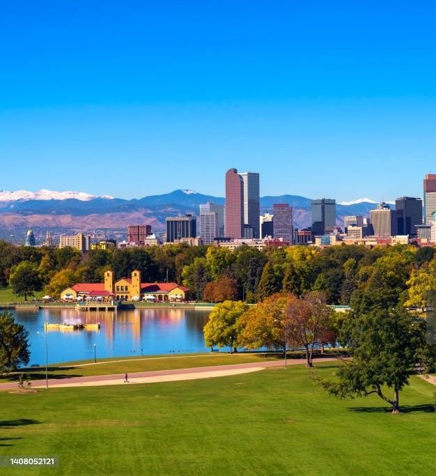 Skyline of Denver downtown with Rocky Mountains