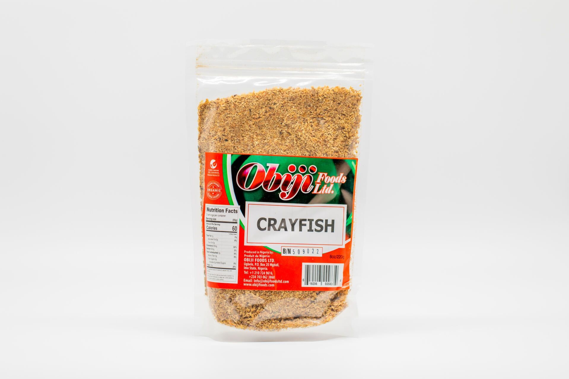 A bag of crayfish seasoning is sitting on a white surface.