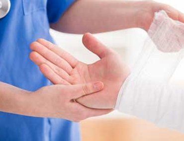 A nurse bandaging someone's wrist