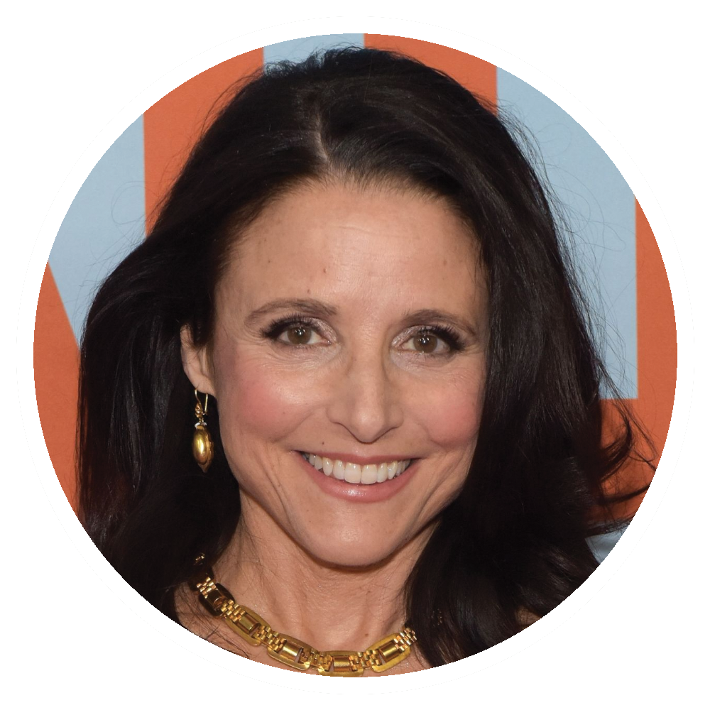 Julia Louis-Dreyfus smiling, wearing a gold necklace and earrings, with a light blue and orange background.