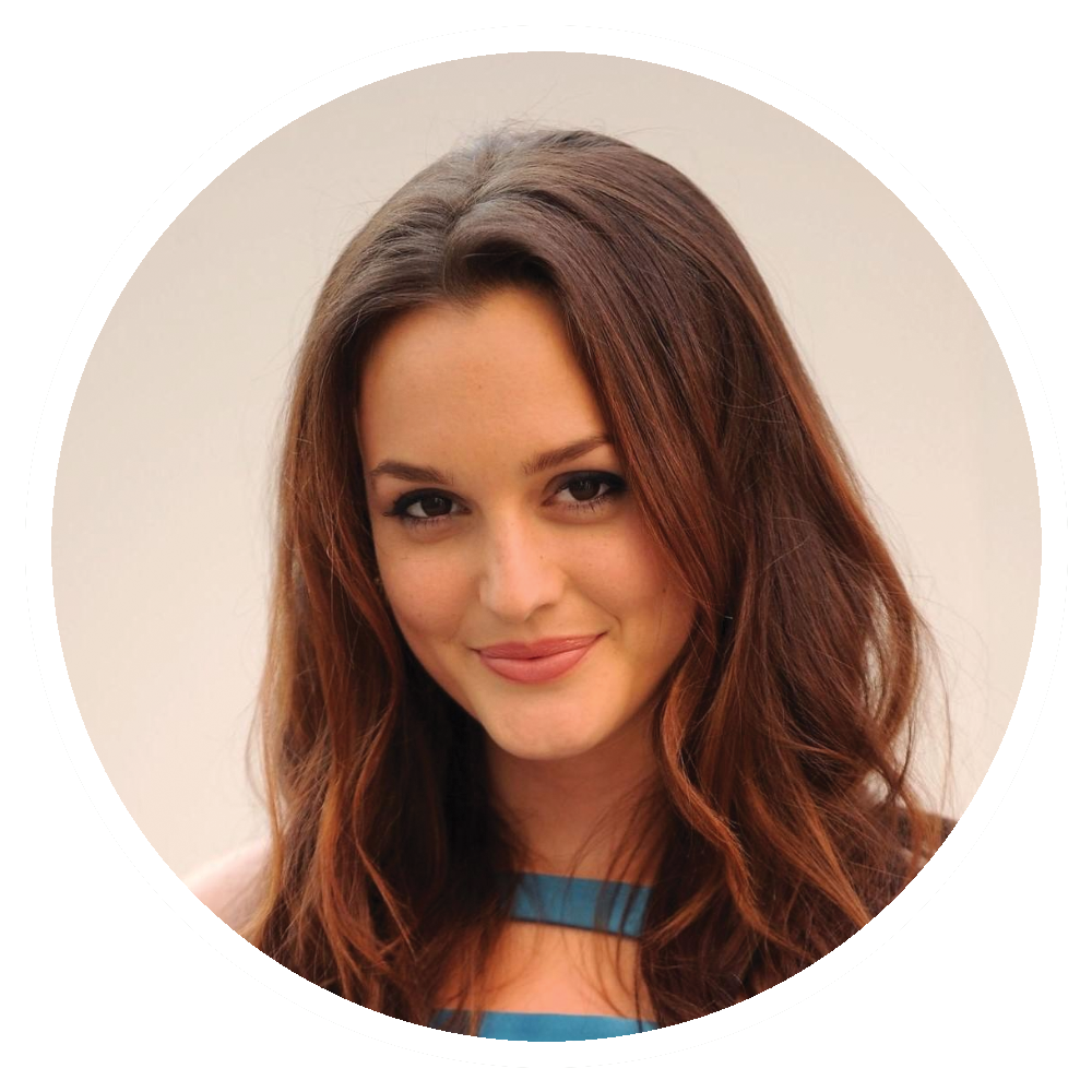 Leighton Meester with long, wavy brown hair, smiling, wearing a blue top.