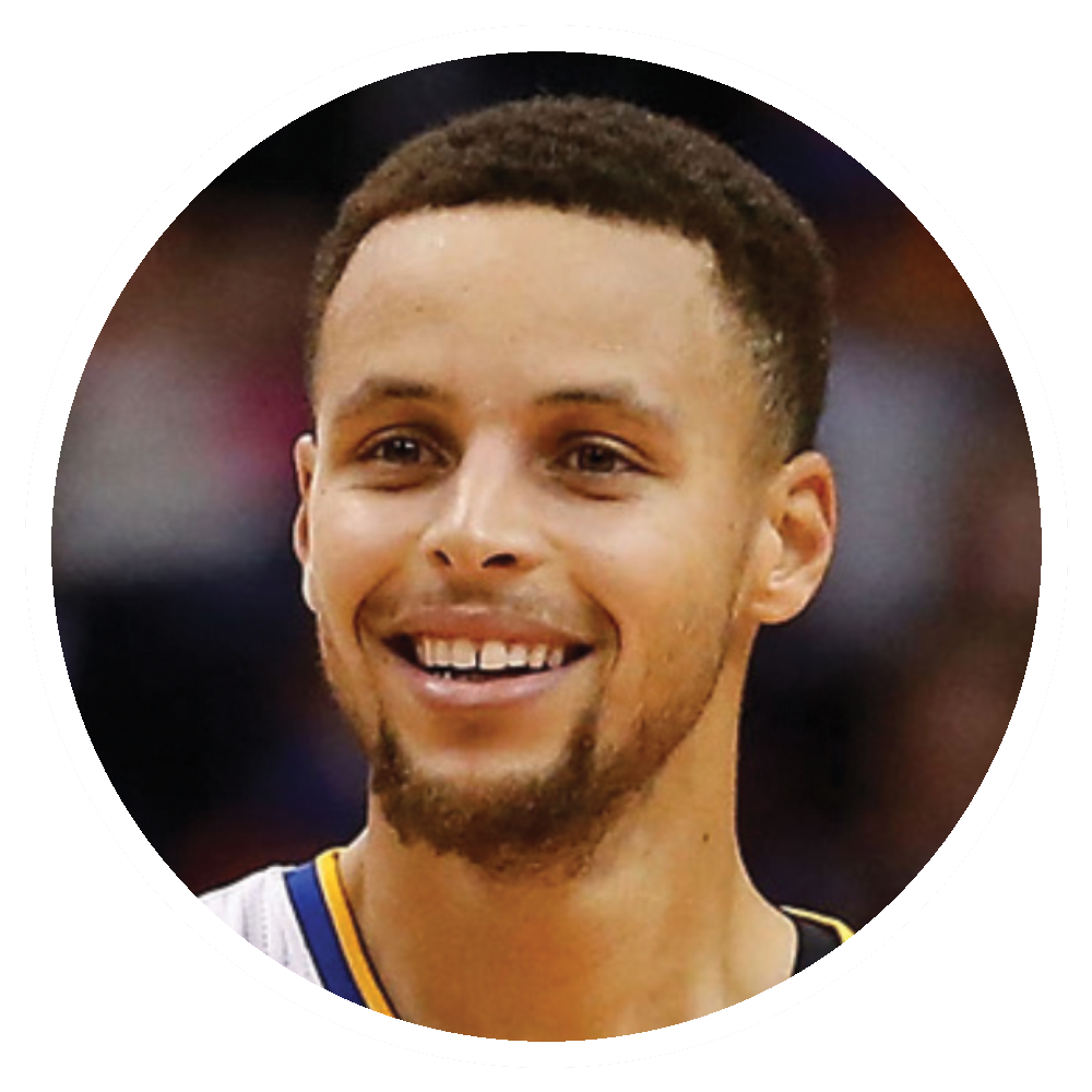 Steve Curry with short hair and a goatee, wearing a basketball jersey.