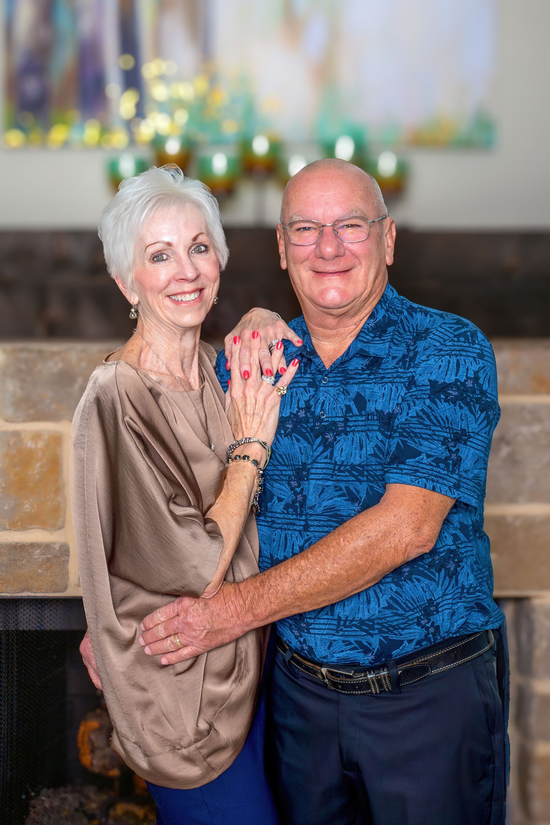 A man and a woman are posing for a picture in a black and white photo.