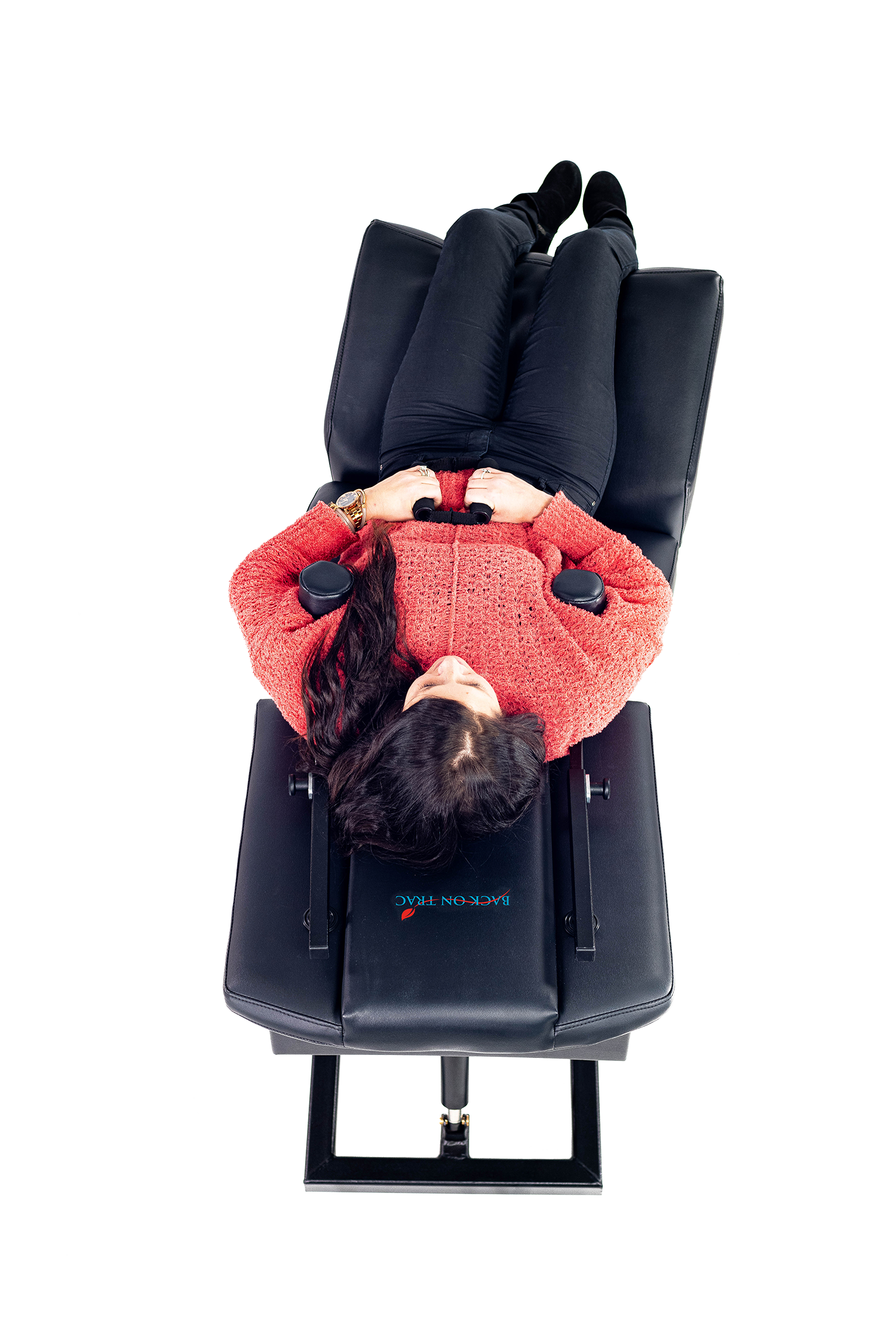woman using back on trac decompression chair