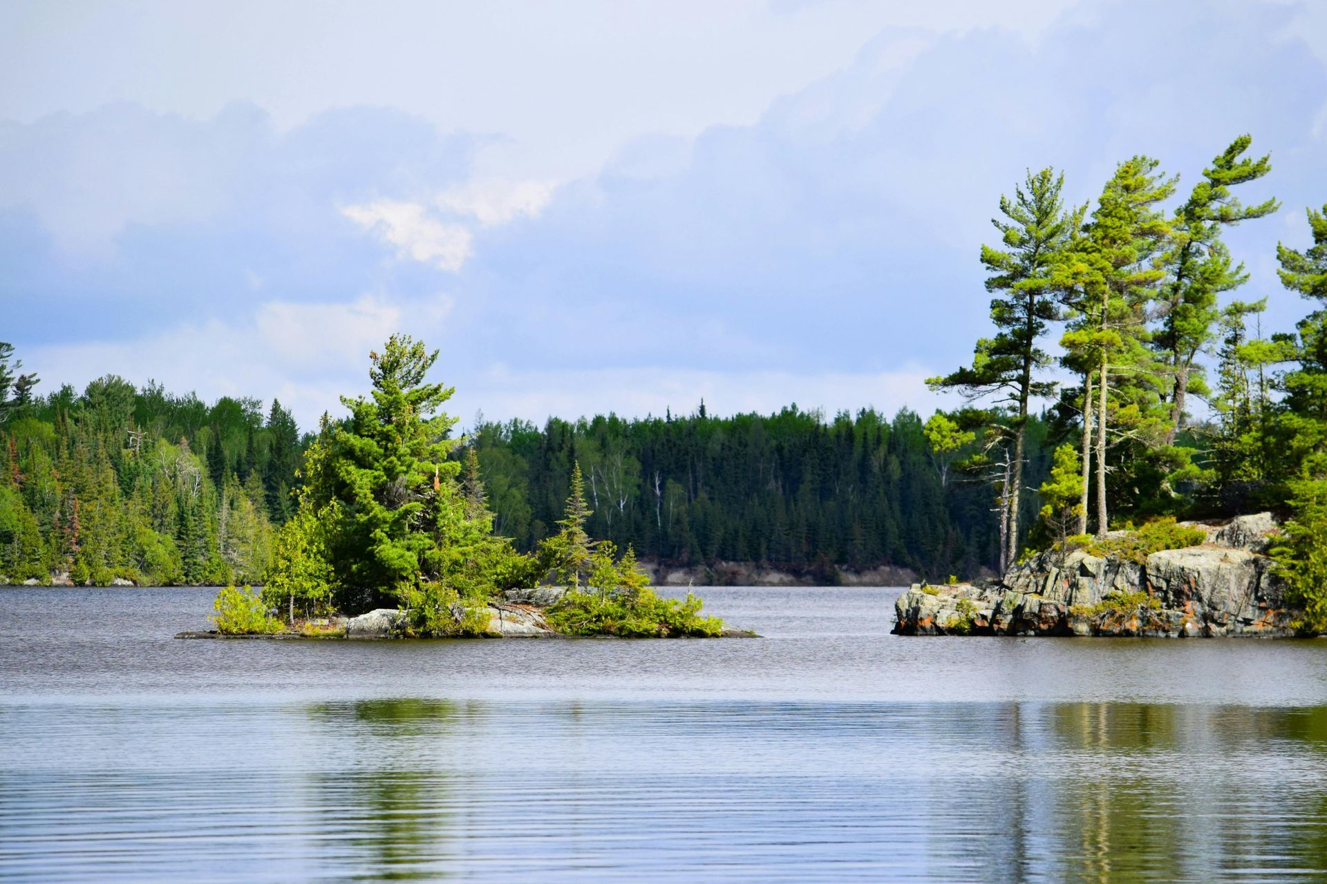 A sun room with a bench and a sign that says `` cottage ''.
