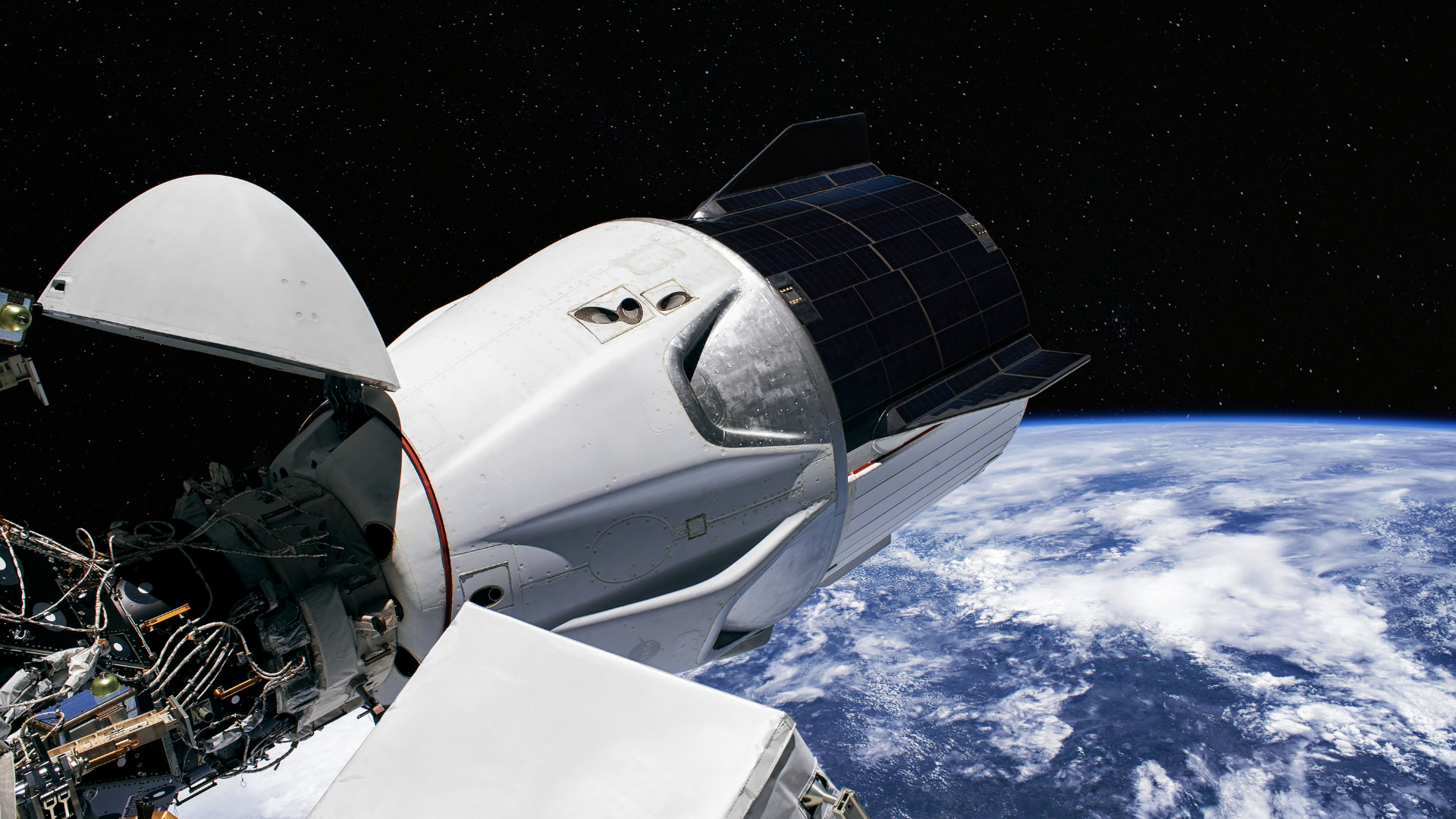 An artist 's impression of a space shuttle flying over the earth