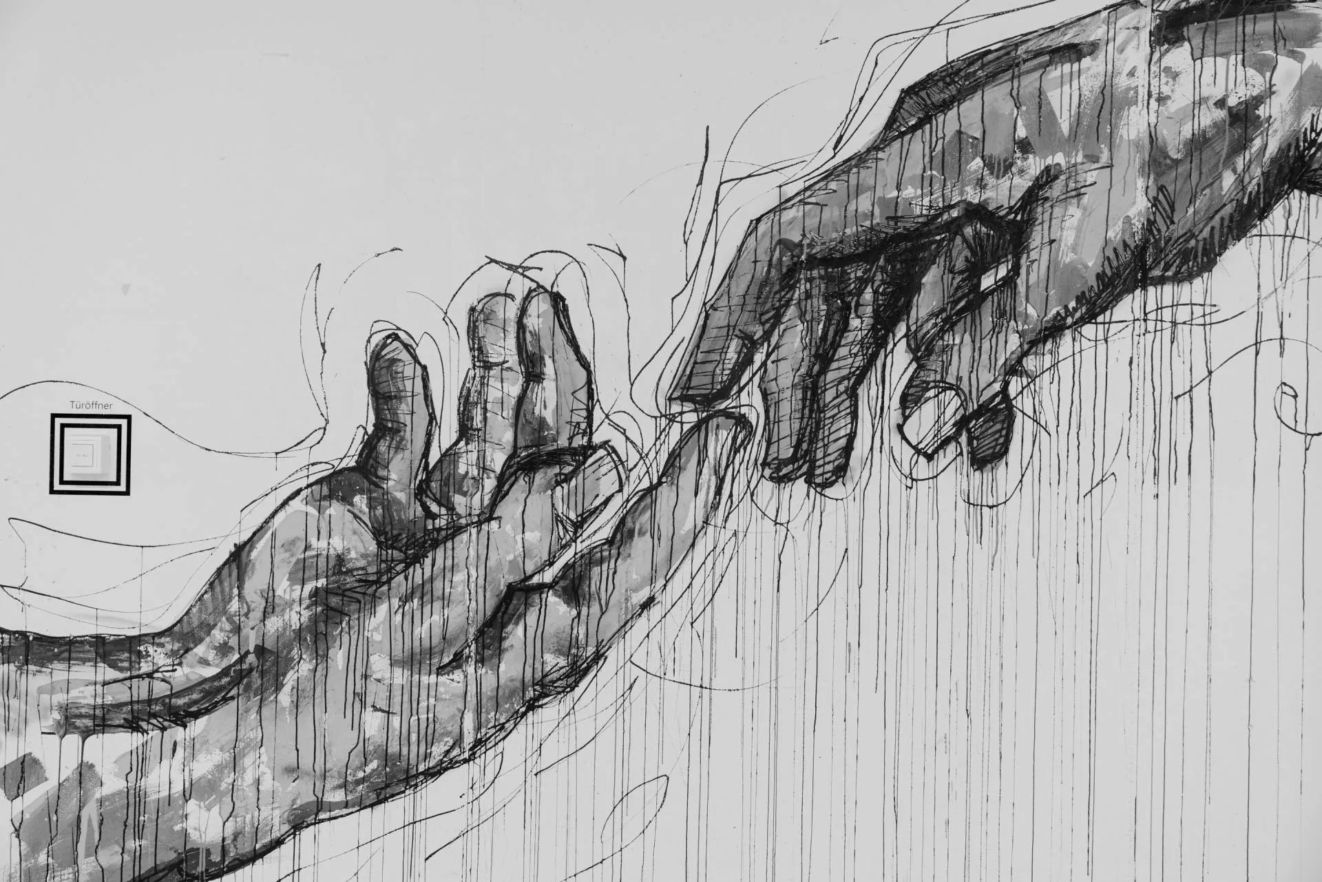 A black and white drawing of two hands reaching for each other.