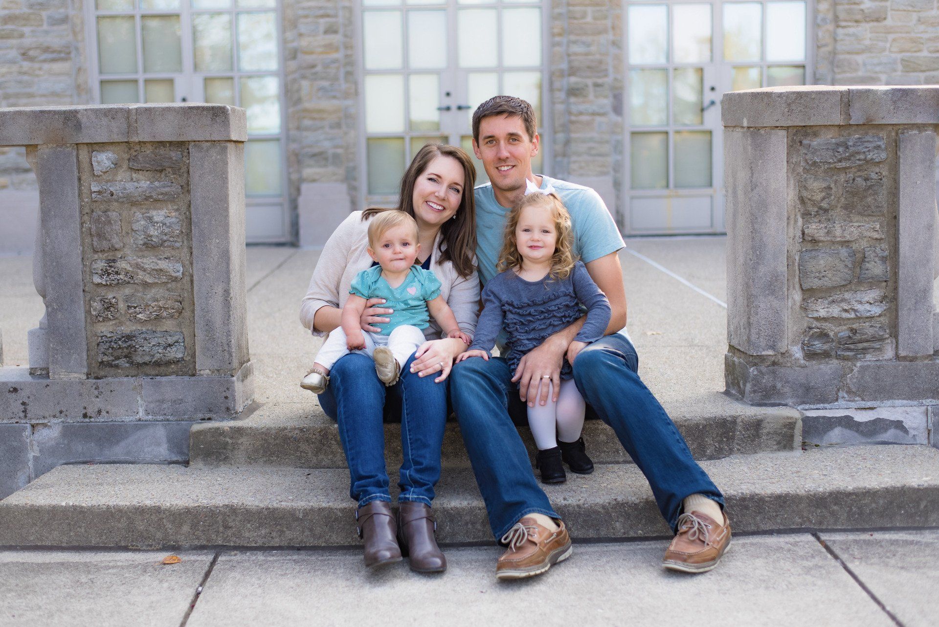 Dr. Annie Enzweiler and her family on steps image