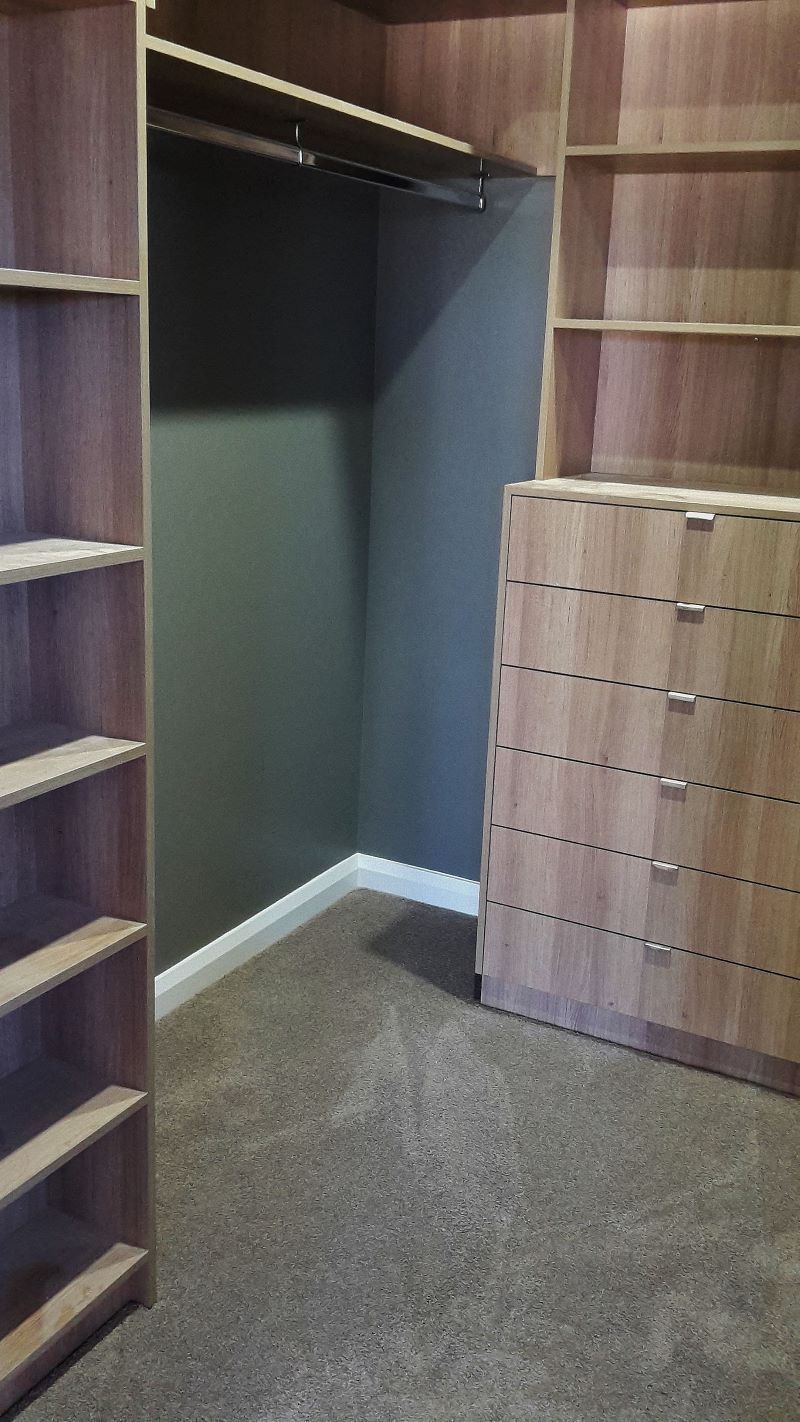A Walk in Closet With Lots of Shelves and Drawers — Aussie Carpets & Vinyl In Beerwah, QLD