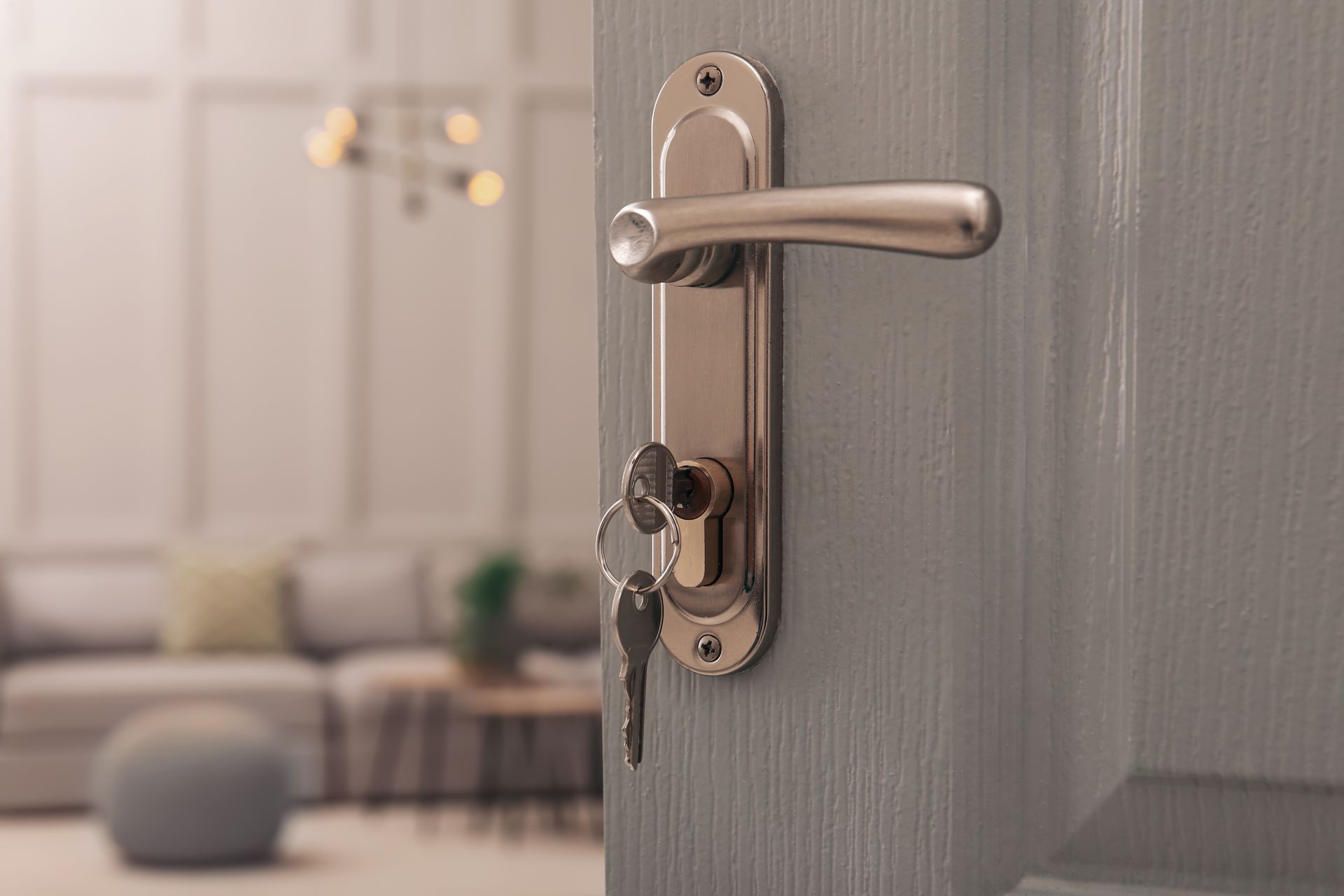 Yellow velvet armchair with cushioned back.