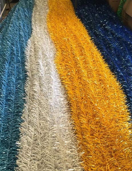 blue yellow and white Christmas tinsel
