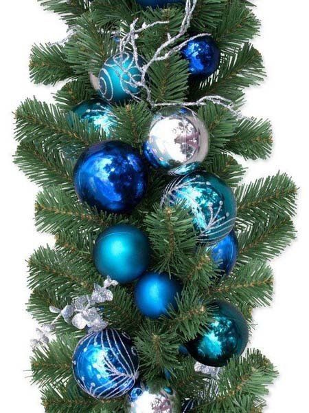 blue Christmas bulbs on small tree