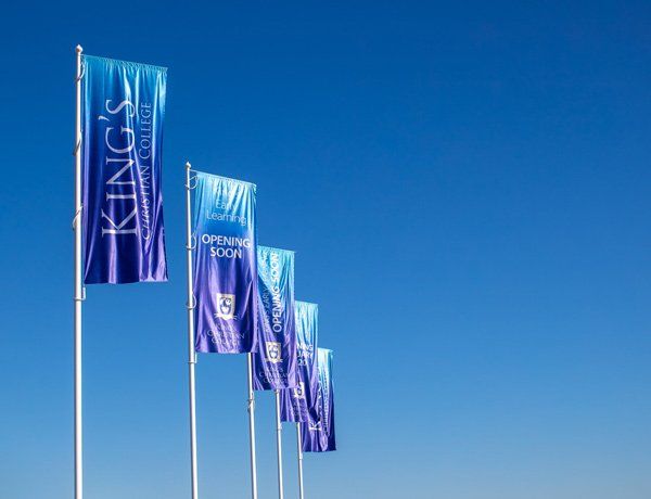 blue banners on flagpoles