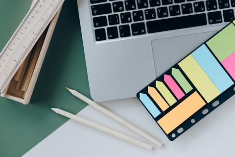 Picture of laptop, ruler, pencils and sticky notes
