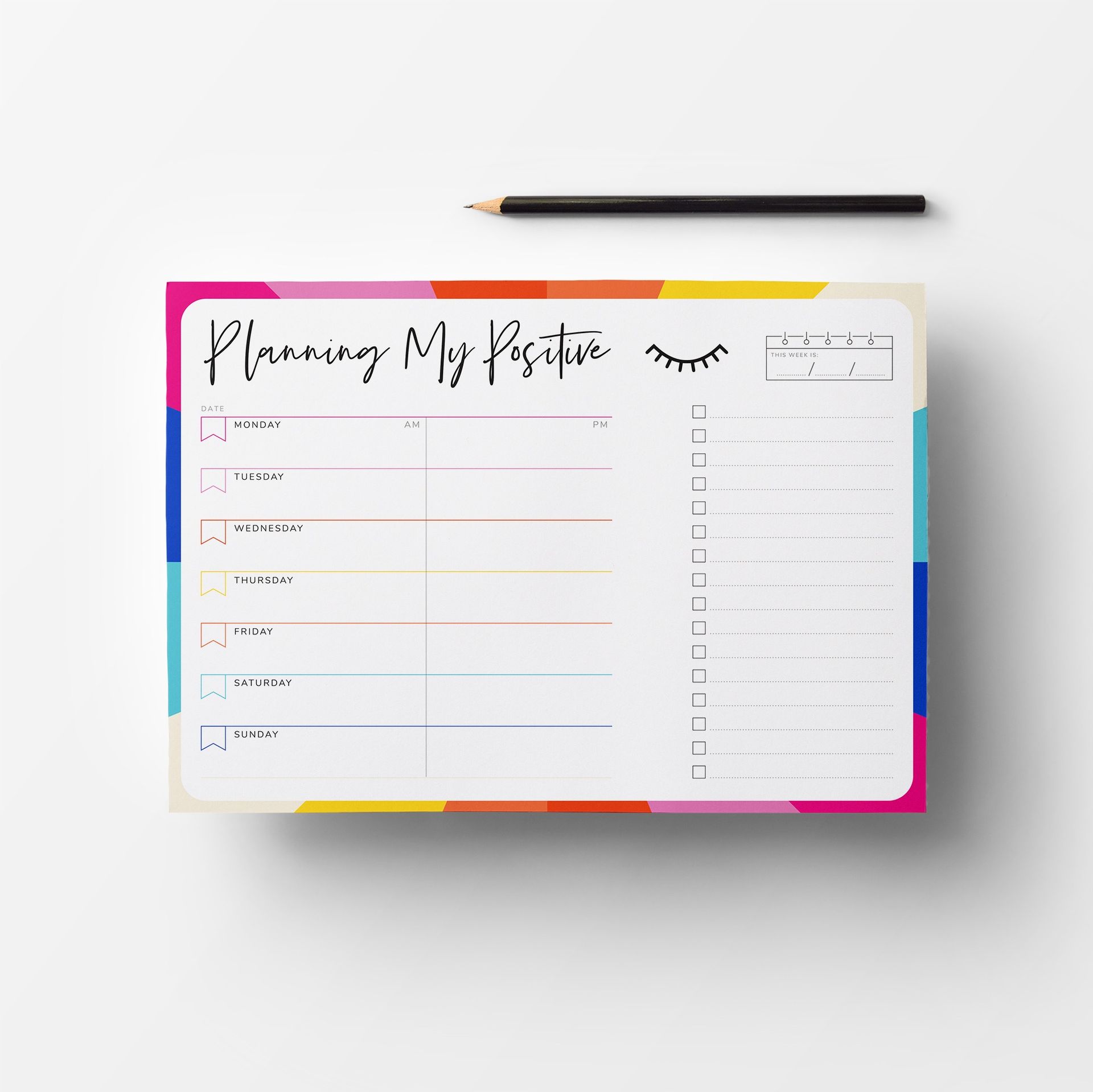 A planner with a pencil next to it that says planning my positive