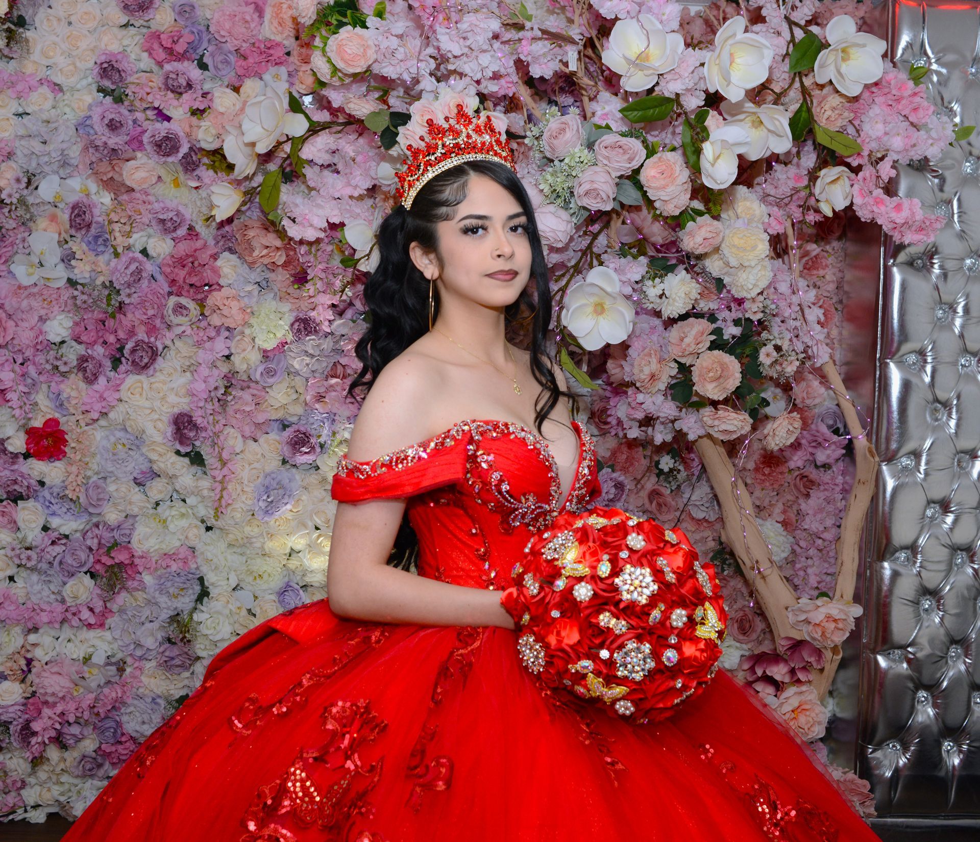 A group of people are holding sparklers and champagne glasses.