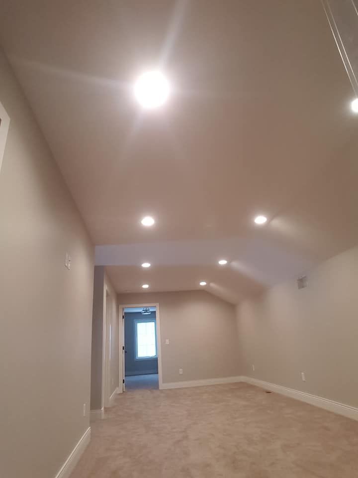 drywall with can lights in a home