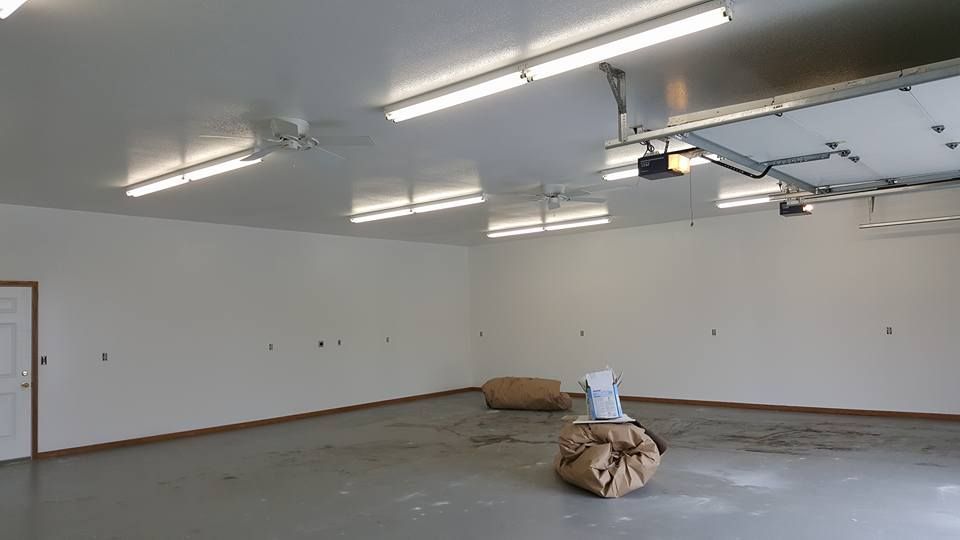 New drywall with a white finish in a garage