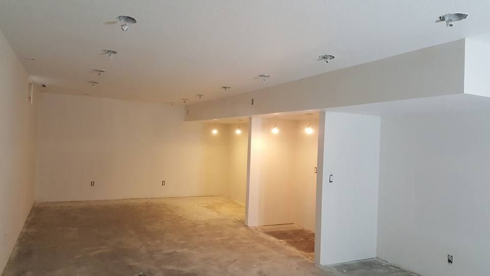 drywall installation on a ceiling and walls for new construction