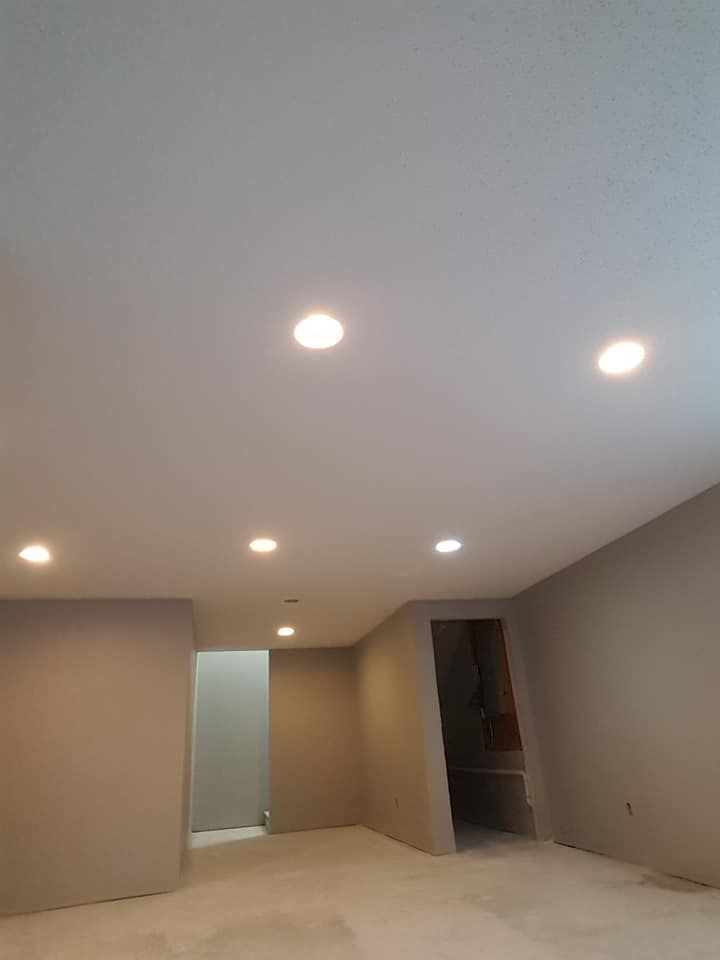 new textured ceiling with can lights
