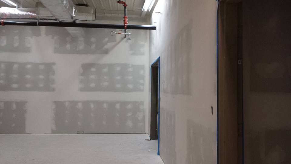 commercial drywall installation around fire suppression system