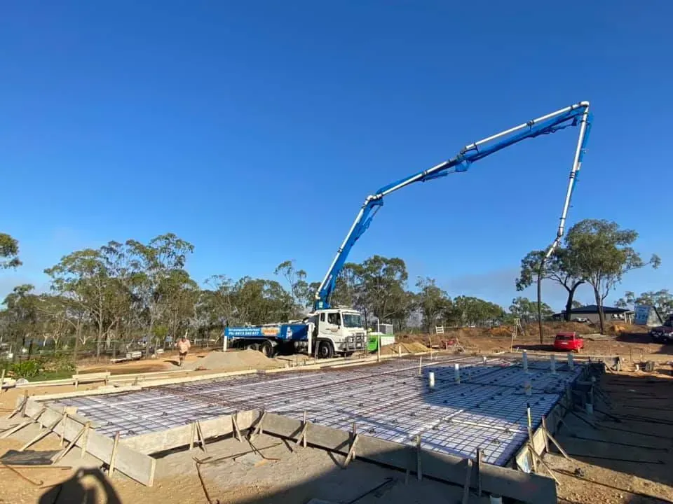 Concrete Pump Truck Pouring Concrete — Far Northern Concrete Pumping in Mareeba, QLD