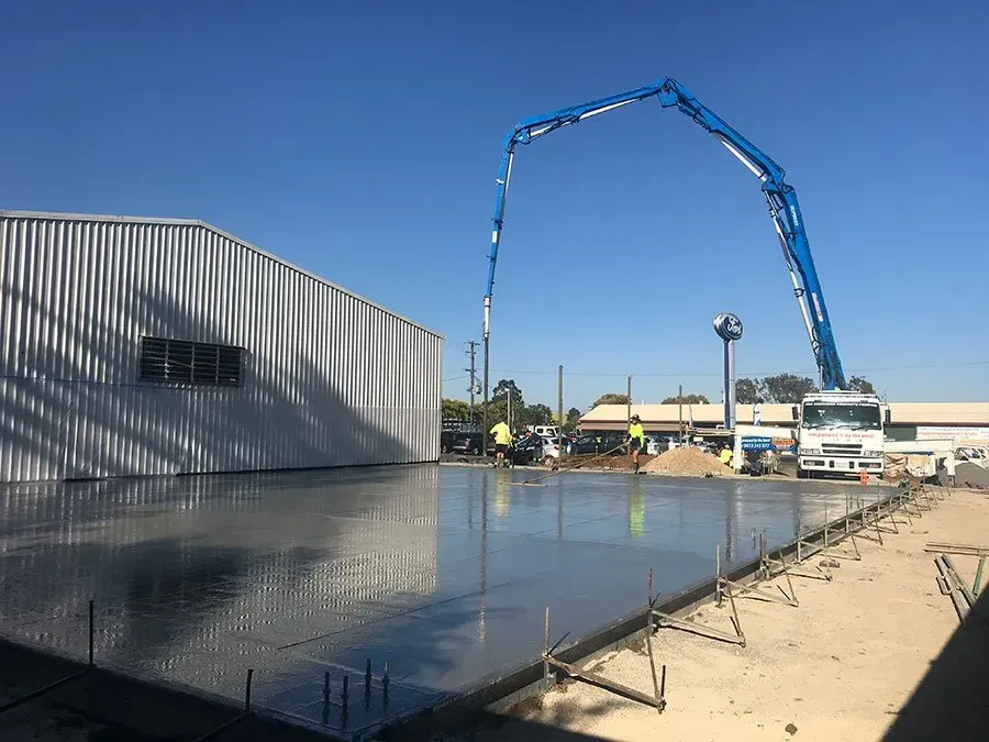 Concrete Being Poured With a Boom Pump — Far Northern Concrete Pumping in Mareeba, QLD