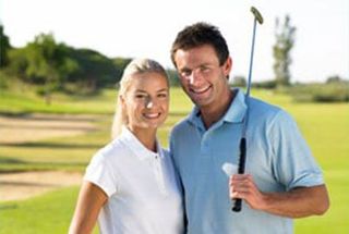 Couple on golf course — Golf Driving & Practice Ranges in Exton, PA